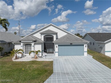 View of front of home featuring a garage and a fro