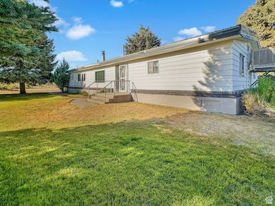 1055 Utah 10, Clawson, UT 84516 - photo 2