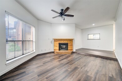 This is a spacious, well-lit living room featuring