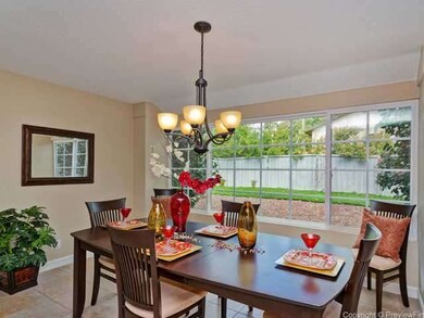 Another bright room with large window.