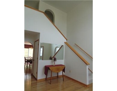 Entry/Foyer. Radiant new hardwood flooring and an 