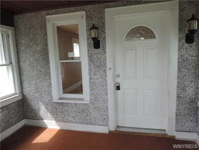 Porch - Enclosed. The enclosed front porch.