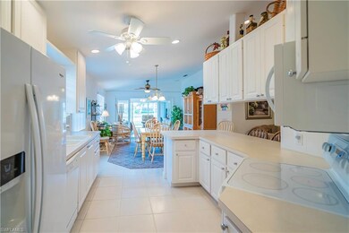 Open kitchen has upgraded refrigerator
