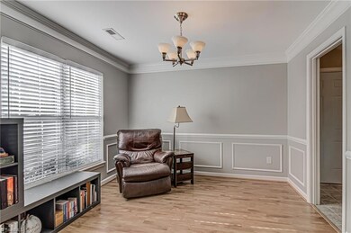 Great floor plan allows for easy flow between entry, living room, kitchen, and dining to the left.