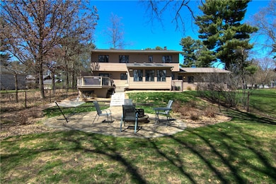 Great fenced area in the backyard with fun fire pi