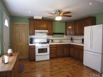 Large kitchen, beautiful flooring, ceiling fan, re