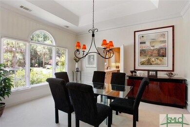 Formal Dining Room with doors to Kitchen.