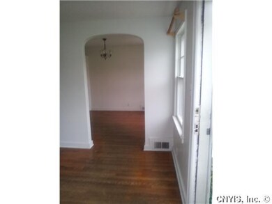 Living Room Arched Doorway Looking into Dinningrm