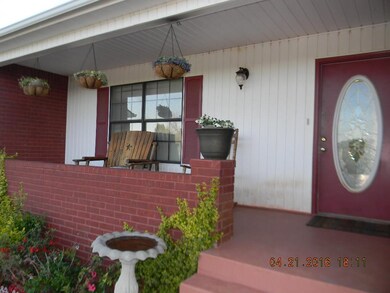 Great covered porch to sit and relax....