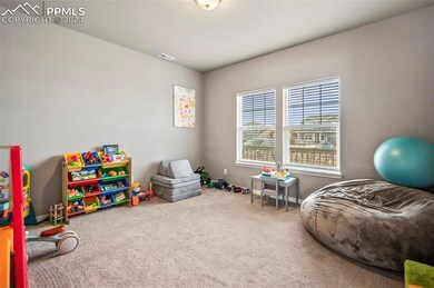 Office with French Doors currently used as playroo