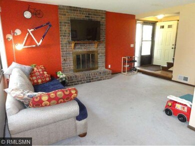 Living room features fireplace, and flows into din
