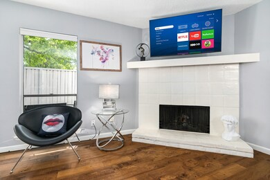 Charming wood burning fireplace.