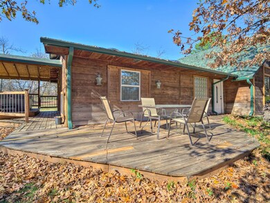 Rear view of house with a deck