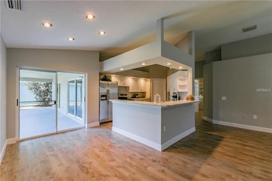 Breakfast area with sliders out to the back yard.