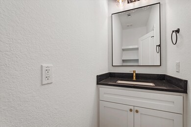 The half bathroom on the first floor includes a bl