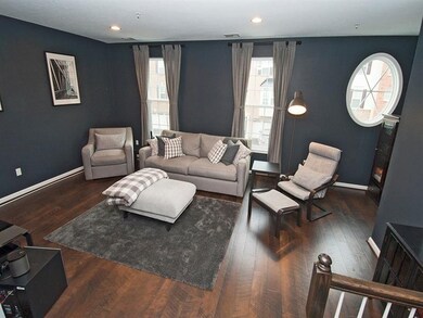 Rich hardwood floors and designer paint colors in 