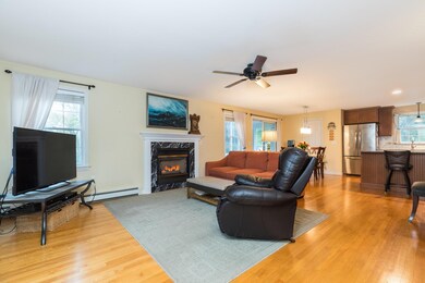 Gas Fireplace And Hardwood Floors Add Warmth To Th