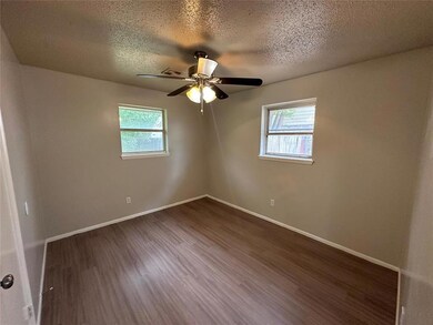 Spare room with plenty of natural light, ceiling f
