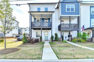 View of property with a front lawn
