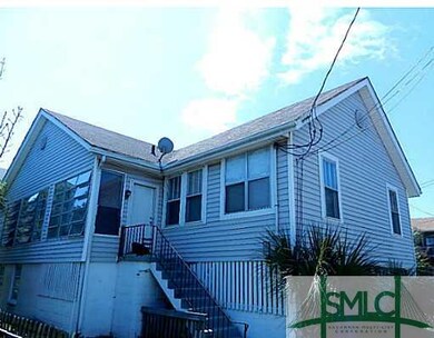 Exterior Front. Large porches on both sides upstai