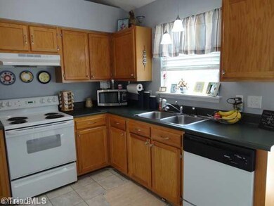 Kitchen. Kitchen Offers Lots of Cabinet Space