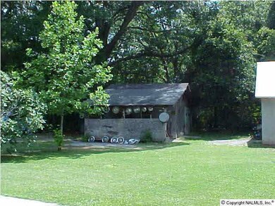 BARN HAS A SHED ON EACH SIDE
