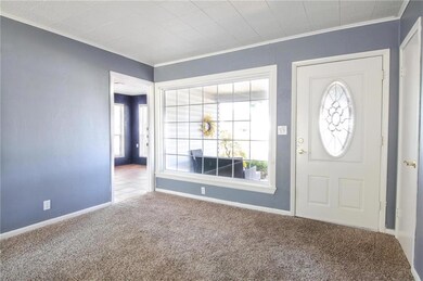 From the living room looking towards the front doo