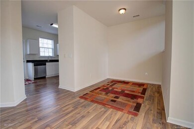 DINING ROOM: The formal dining room features resil