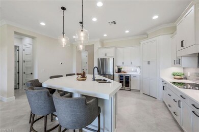 Kitchen featuring a sink, black electric cooktop, 