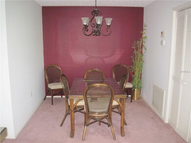 The dining room has easy access to the kitchen for