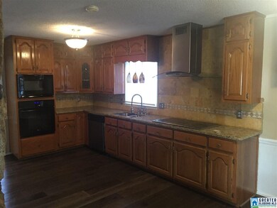 Beautiful finish on original cabinets with clean l