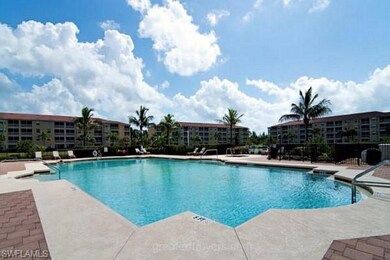 Community pool with a patio area