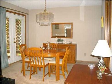 Formal dining with door to deck.