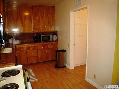 Another view of the kitchen, leading to the laundr