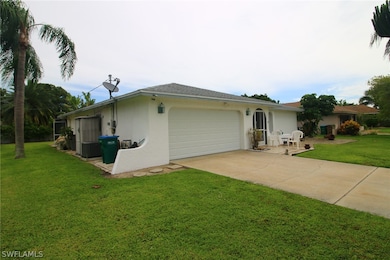 View of front and east side of home.