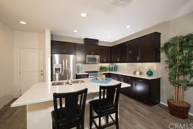 The kitchen in the Plan 3 has ample cabinet space 