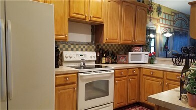 Central Kitchen location opens to the family room 