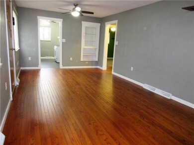 Additional view of living room/dining area combo.