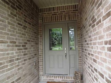 Exterior Front. Covered Entry Will Keep You Dry