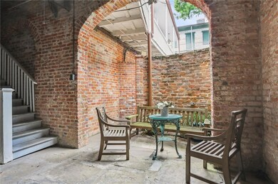 Entryway and stairwell to condo #&