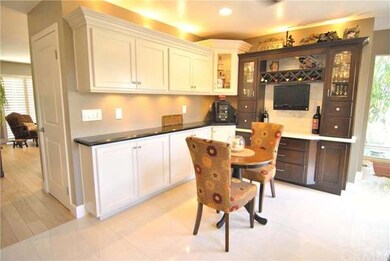 Bistro style dining with custom wine rack and bar.
