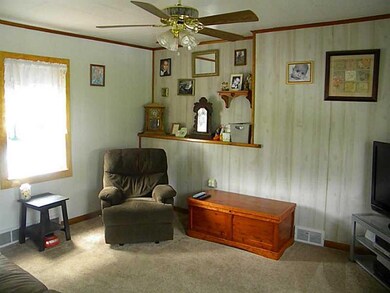Living Room. FRONT ENTRY ENTERS INTO LIVING ROOM