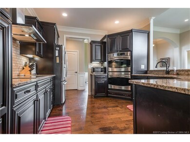 Upgraded cabinetry, double oven, pantry, Granite c