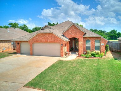 View of front of property featuring a garage and a