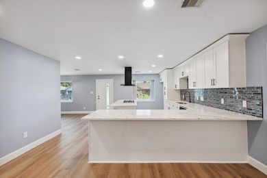 Plenty of sitting area around kitchen