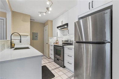 Sparkling kitchen with under-counter lighting, new