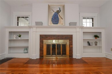 Decorative fireplace with built-in shelving