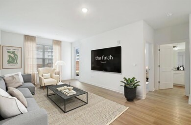 Living room with light wood-type flooring