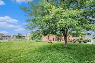View of fenced backyard