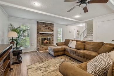Cozy up in the inviting living room, featuring a b